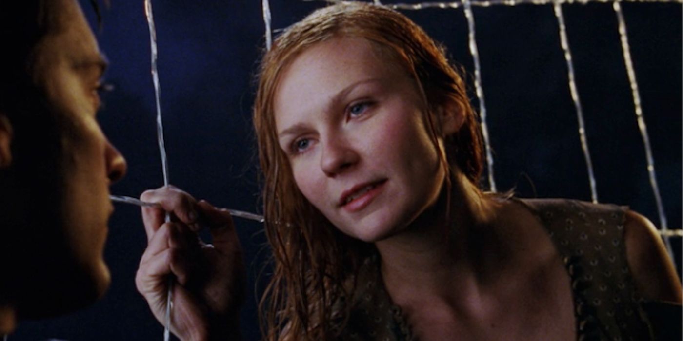 Kirsten Dunst in a web in Spider-Man with Tobey Maguire