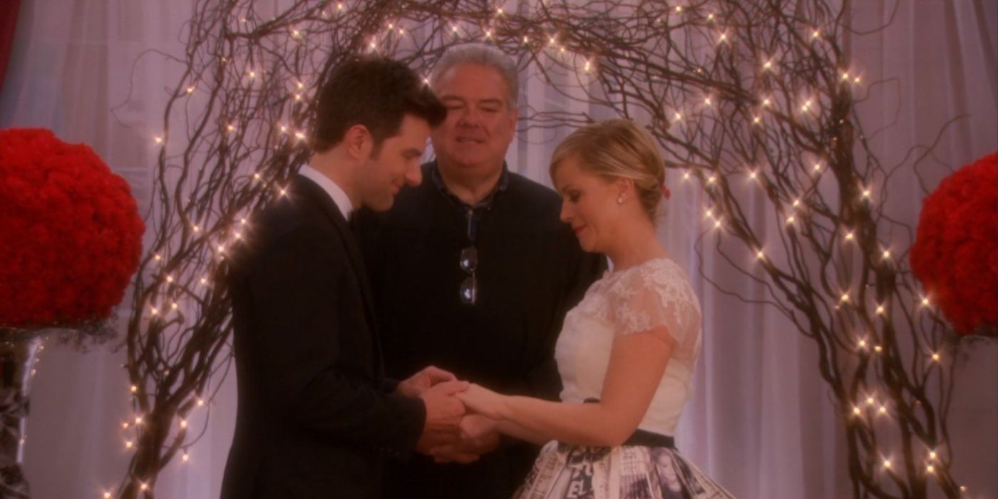 Leslie and Ben exchanging their wedding vows.