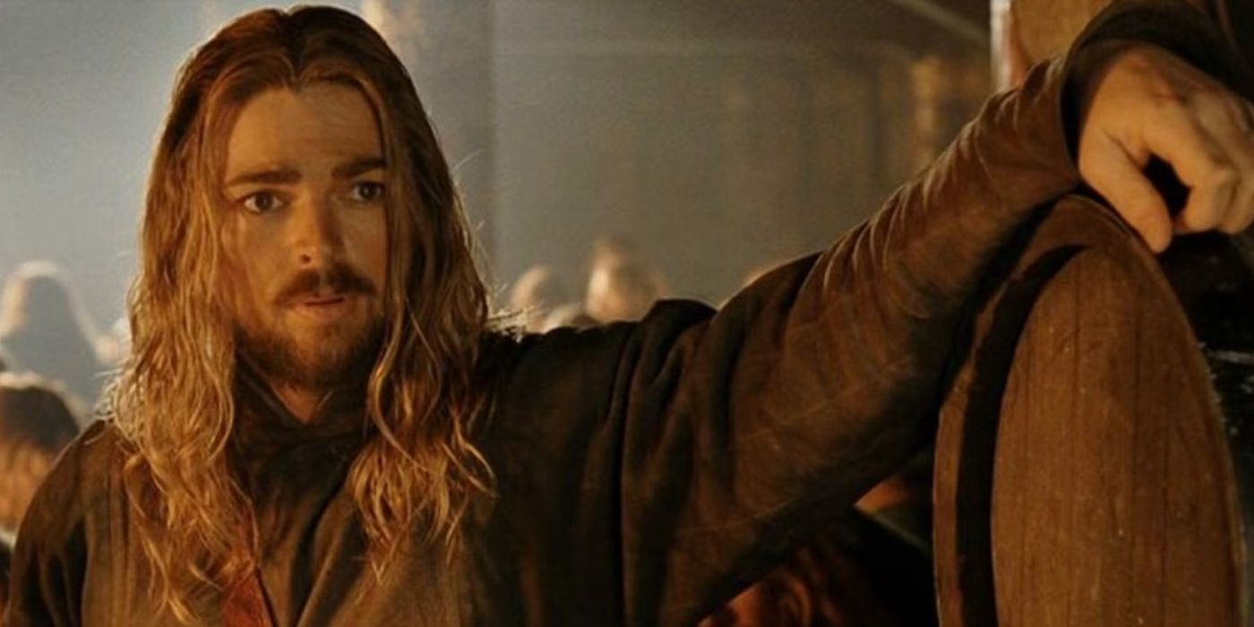 Eomer holds an arm up in Lord of the Rings