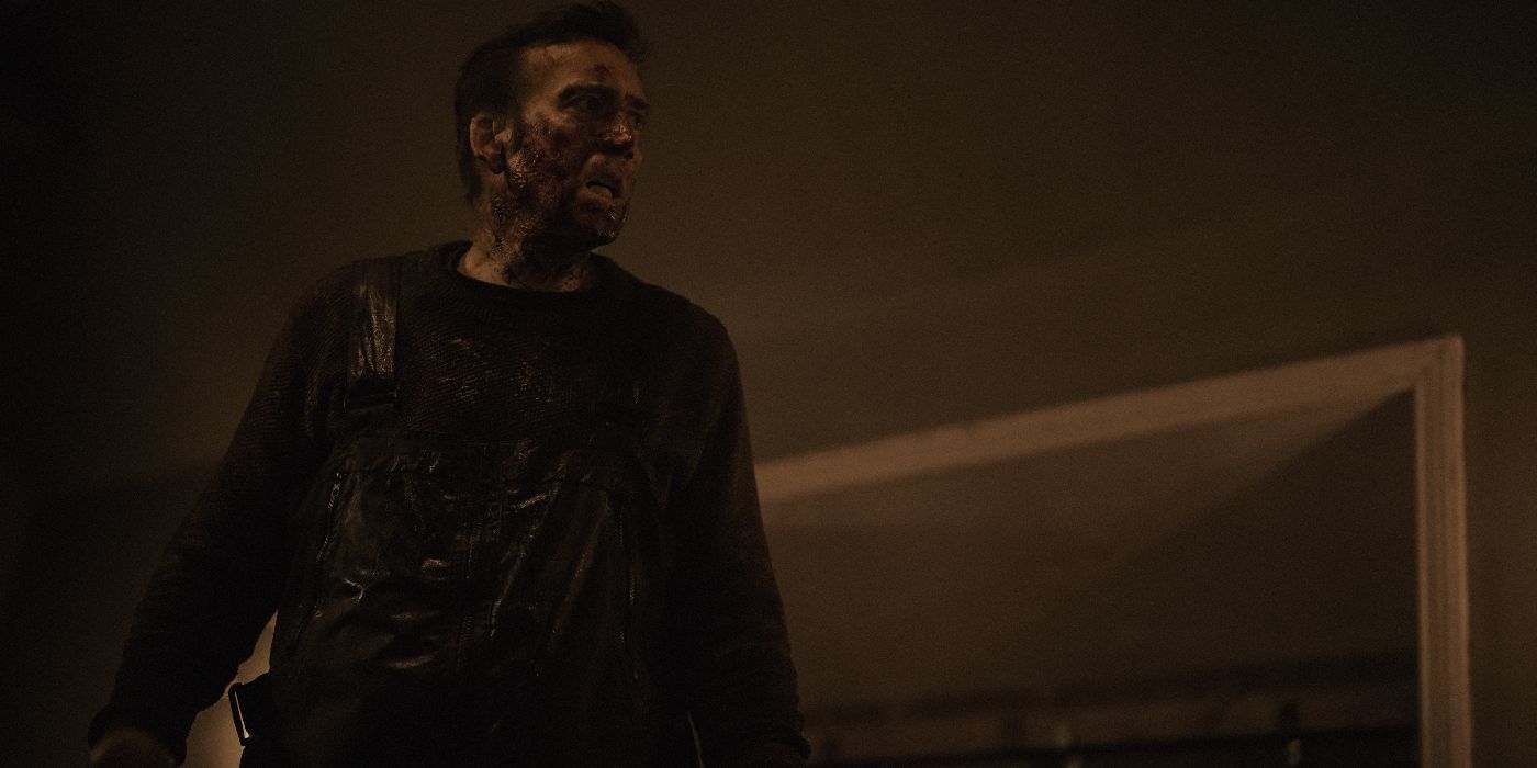 Nicolas Cage bloodied and dirty in the 2024 movie Arcadian