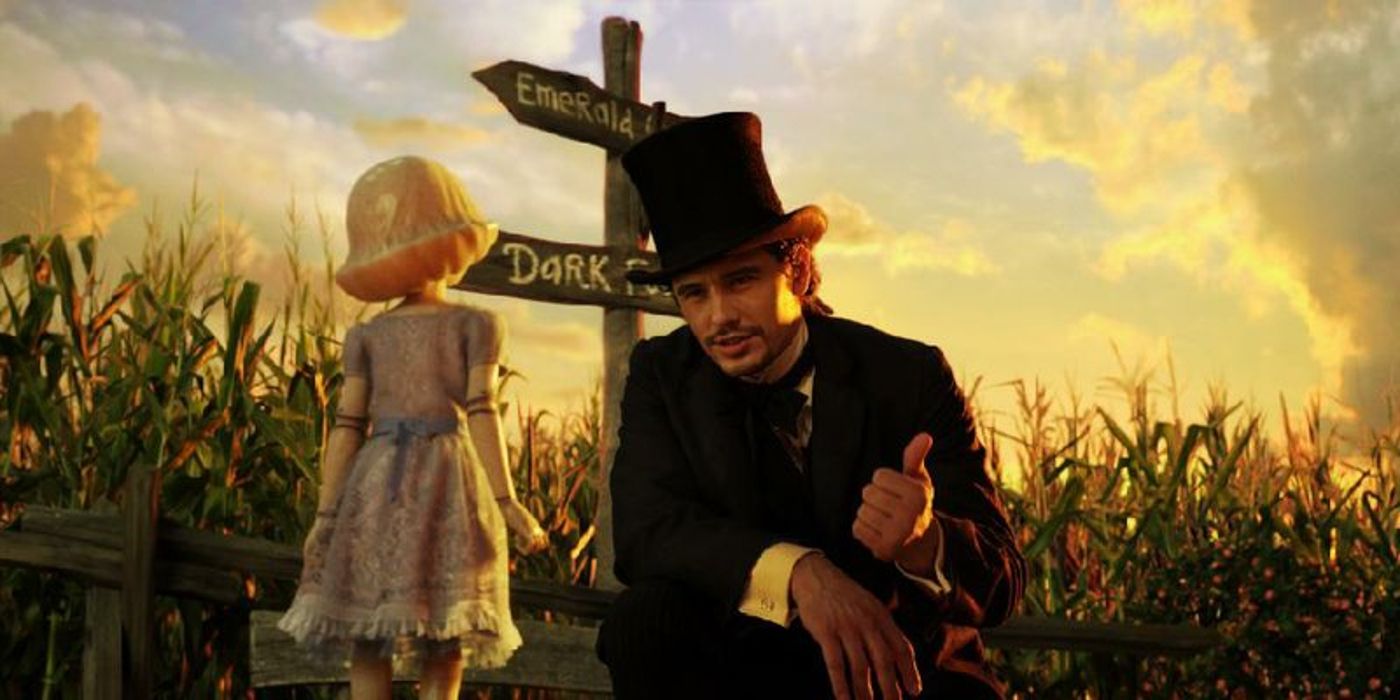 James Franco as Oscar hitchhiking outside in Oz the Great and Powerful