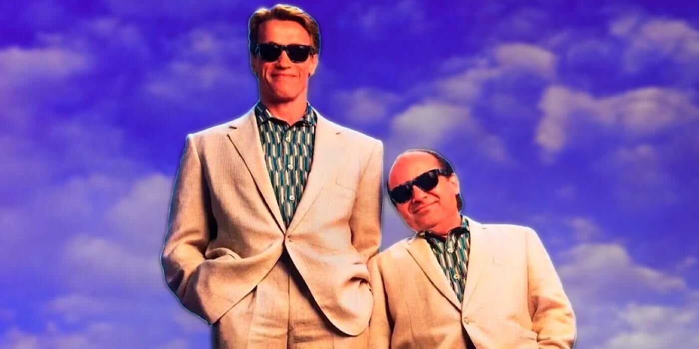 Schwarzenegger and DeVito leaning against each other in suits as Twins