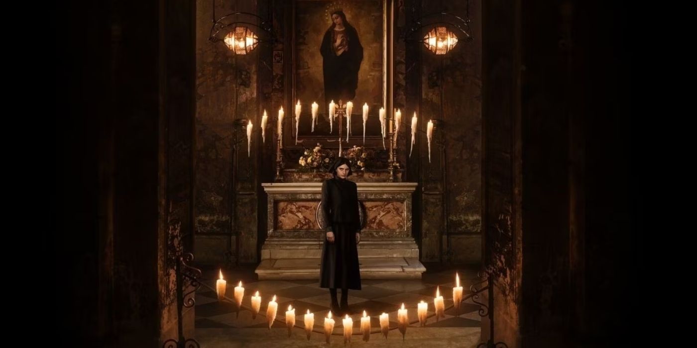The First Omen 2024 movie with woman in church with candles