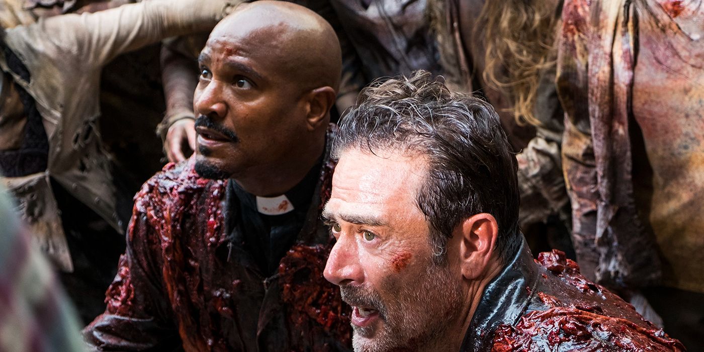 Gabriel and Negan covered in walker guts and blood in The Walking Dead