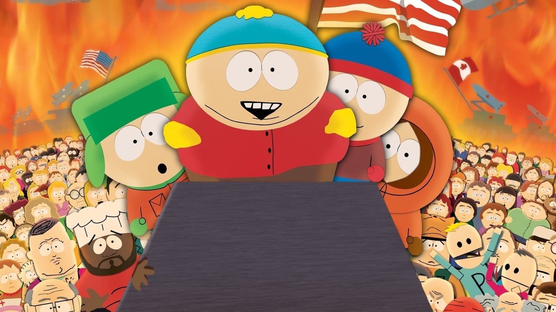 Cartman, Kyle, Stan, and Kenny stand before the town in South Park: Bigger, Longer, & Uncut