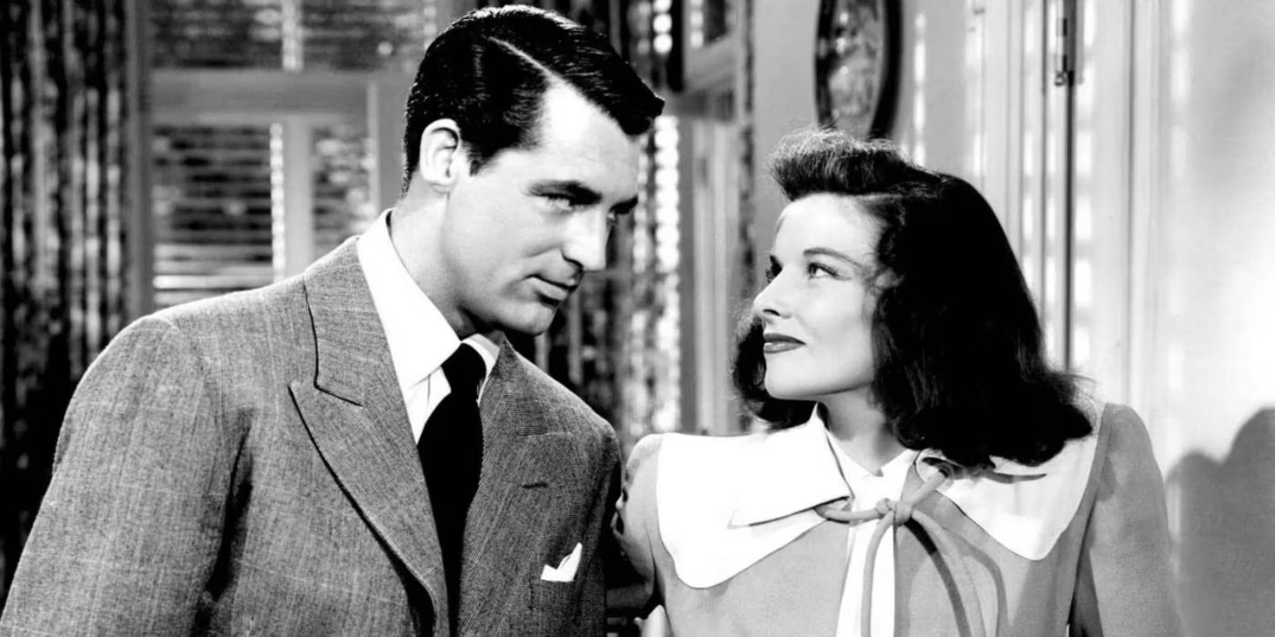 Cary Grant as C. K. Dexter Haven and Katharine Hepburn as Tracy Lord smiling in The Philadelphia Story