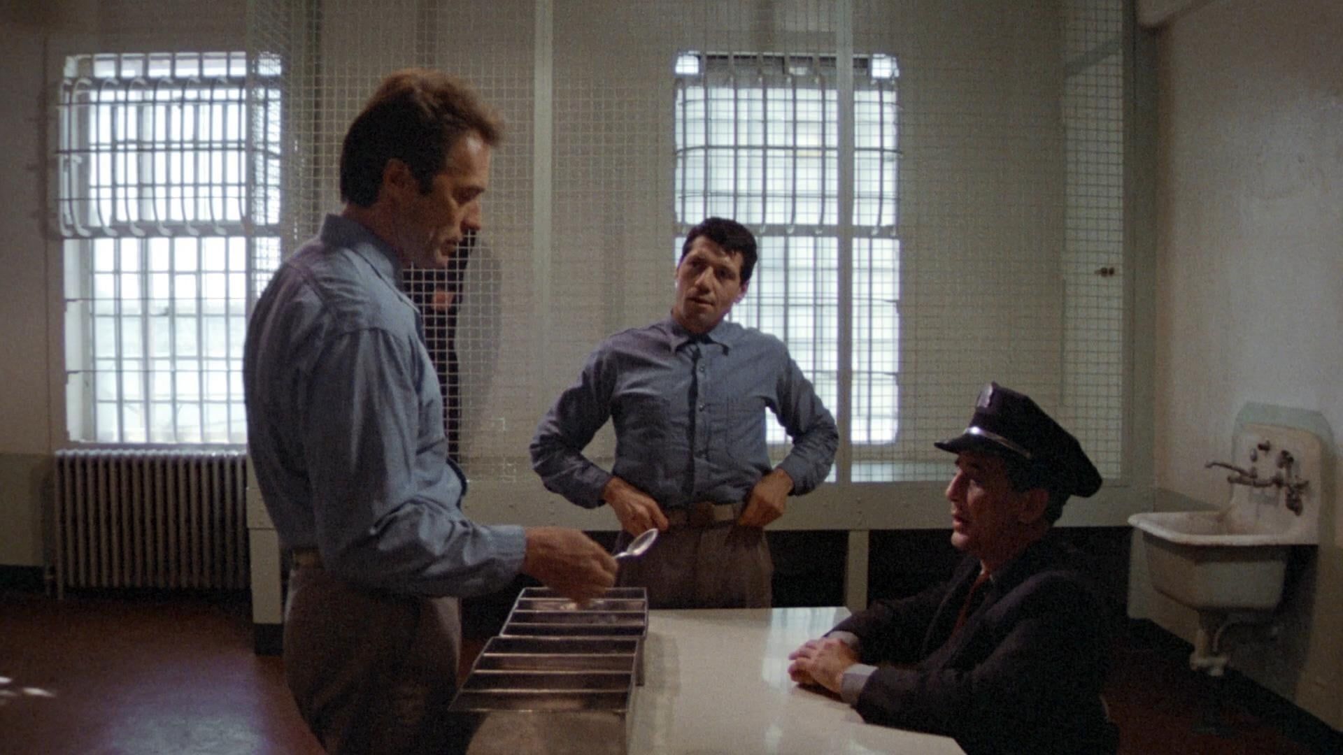 Clint Eastwood facing warden in Escape from Alcatraz (1979)