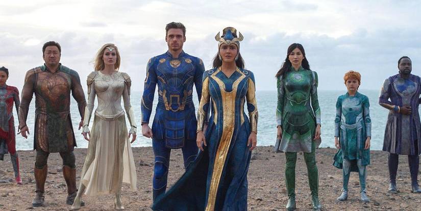 The Eternals characters standing on the beach together