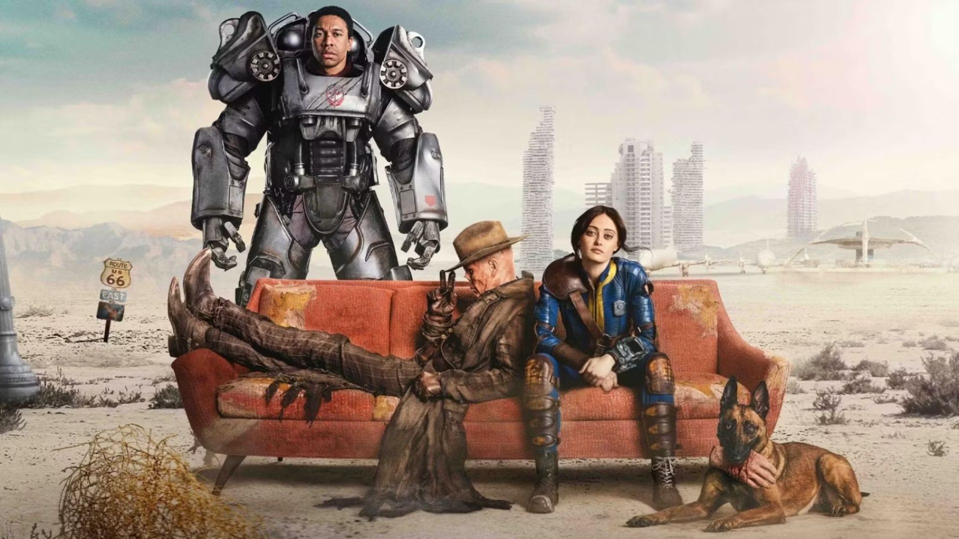 Ella Purnell, Walton Goggins, and Aaron Clifton Moten sitting on a couch in the wasteland in Fallout