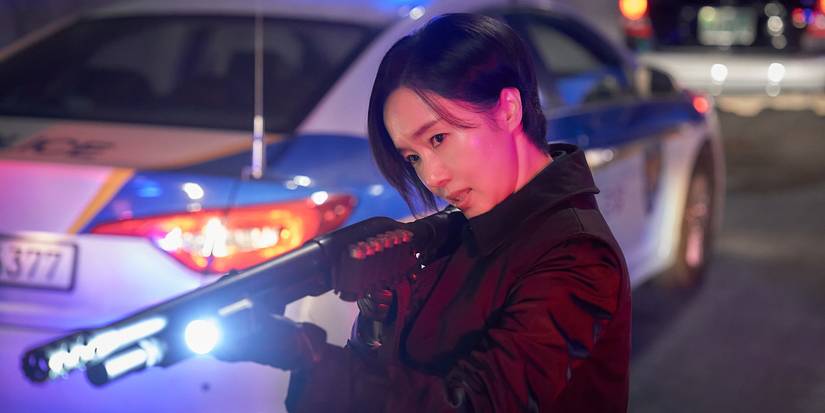 Parasyte The Grey star Lee Jung-hyun as Choi Jun-kyung with a shotgun