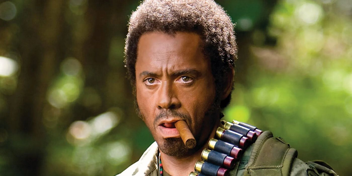 Robert Downey Jr as Kirk Lazarus in Tropic Thunder with cigar in mouth