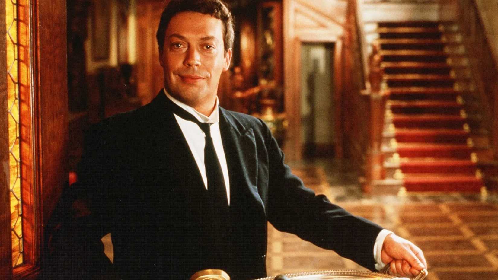 Tim Curry as the butler in the film Clue (1985)