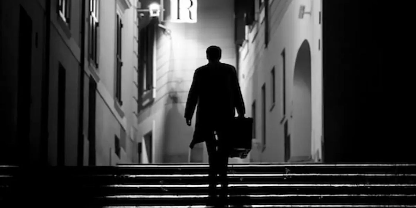 Tom Ripley silhouette walking up Italy stairs