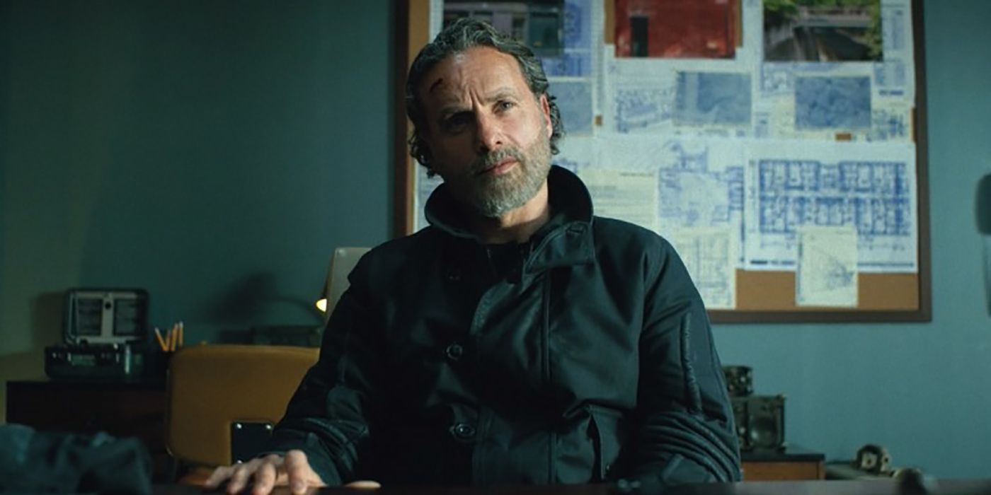 Rick listening to Beale during the Echelon briefing on The Walking Dead: The Ones Who Live.