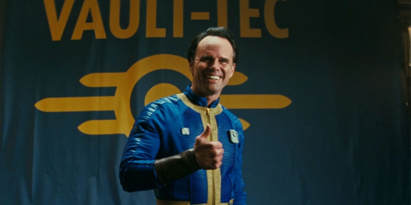 Walton Goggins wearing a vault-tec jumpsuit giving a thumbs up for a photo in Fallout