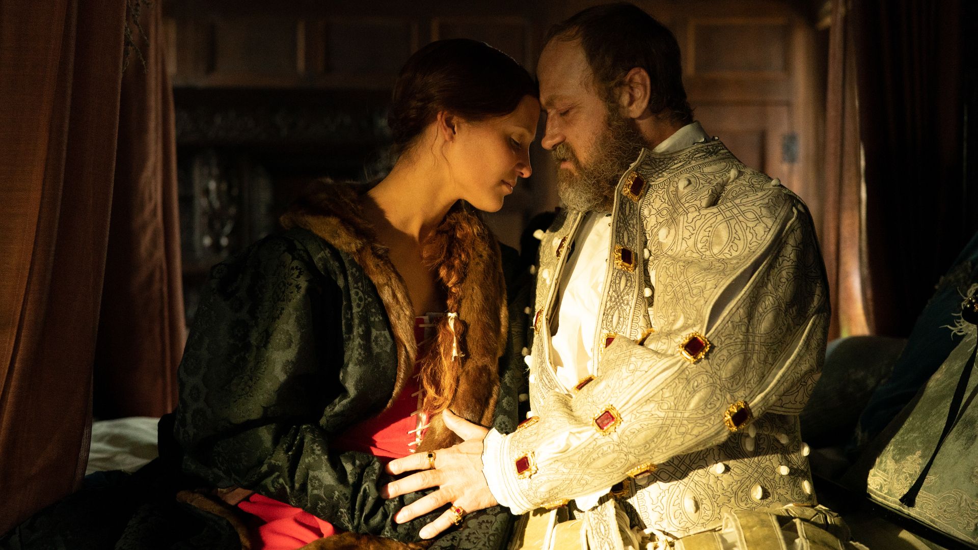 Alicia Vikander as Katherine and Jude Law as King Henry VIII in Firebrand