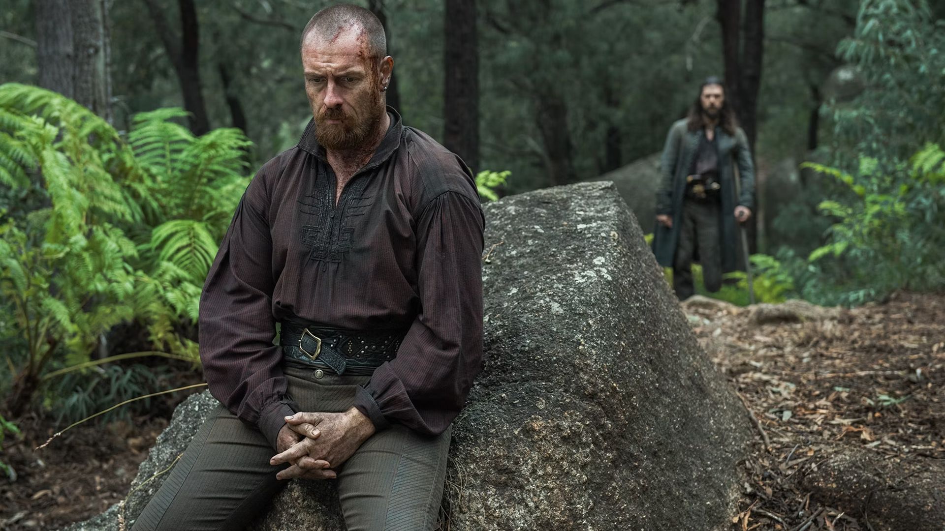 Flint and Silver meet in the woods in Black Sails
