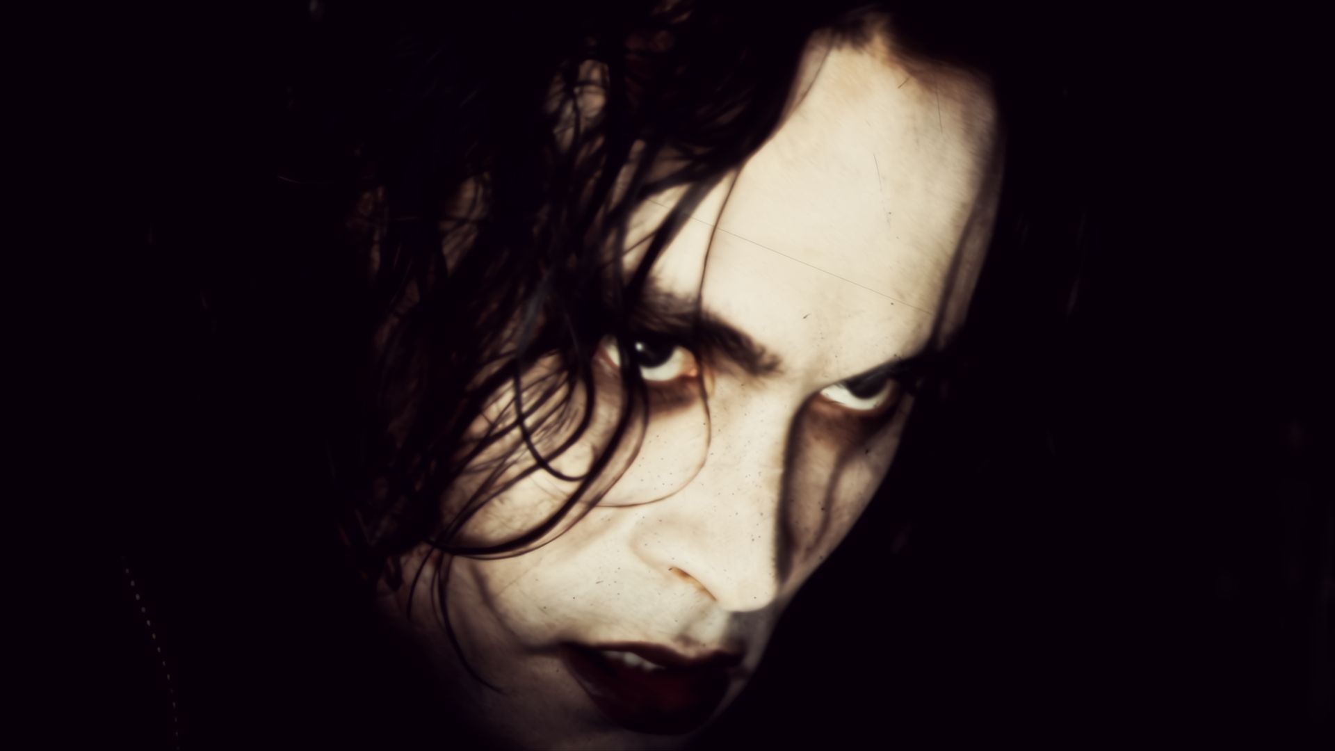 Brandon Lee as Eric Draven in closeup in 1994 movie The Crow