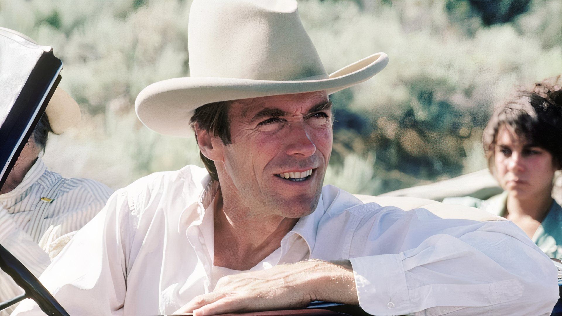 Clint Eastwood wearing a white collared shirt with a cowboy hat in Honkytonk Man