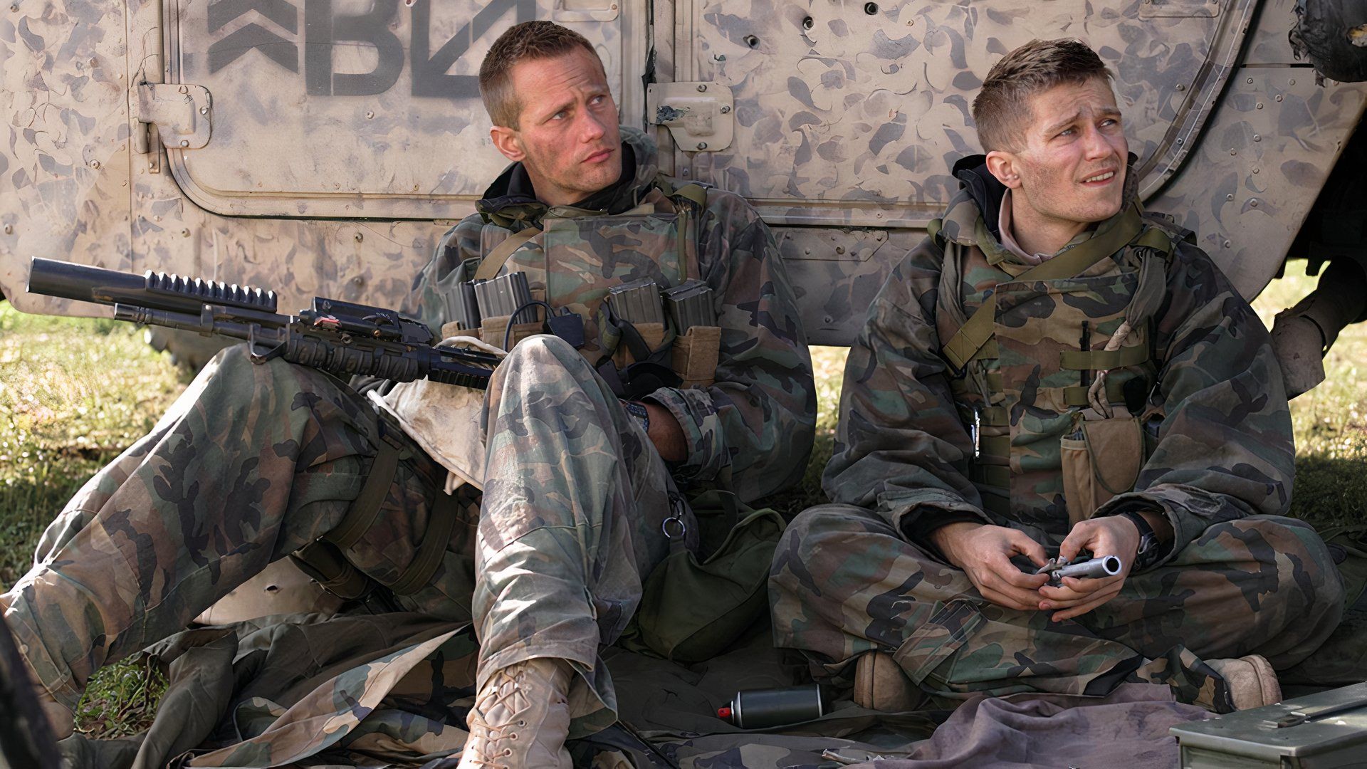 Colbert sits with a soldier in Generation Kill