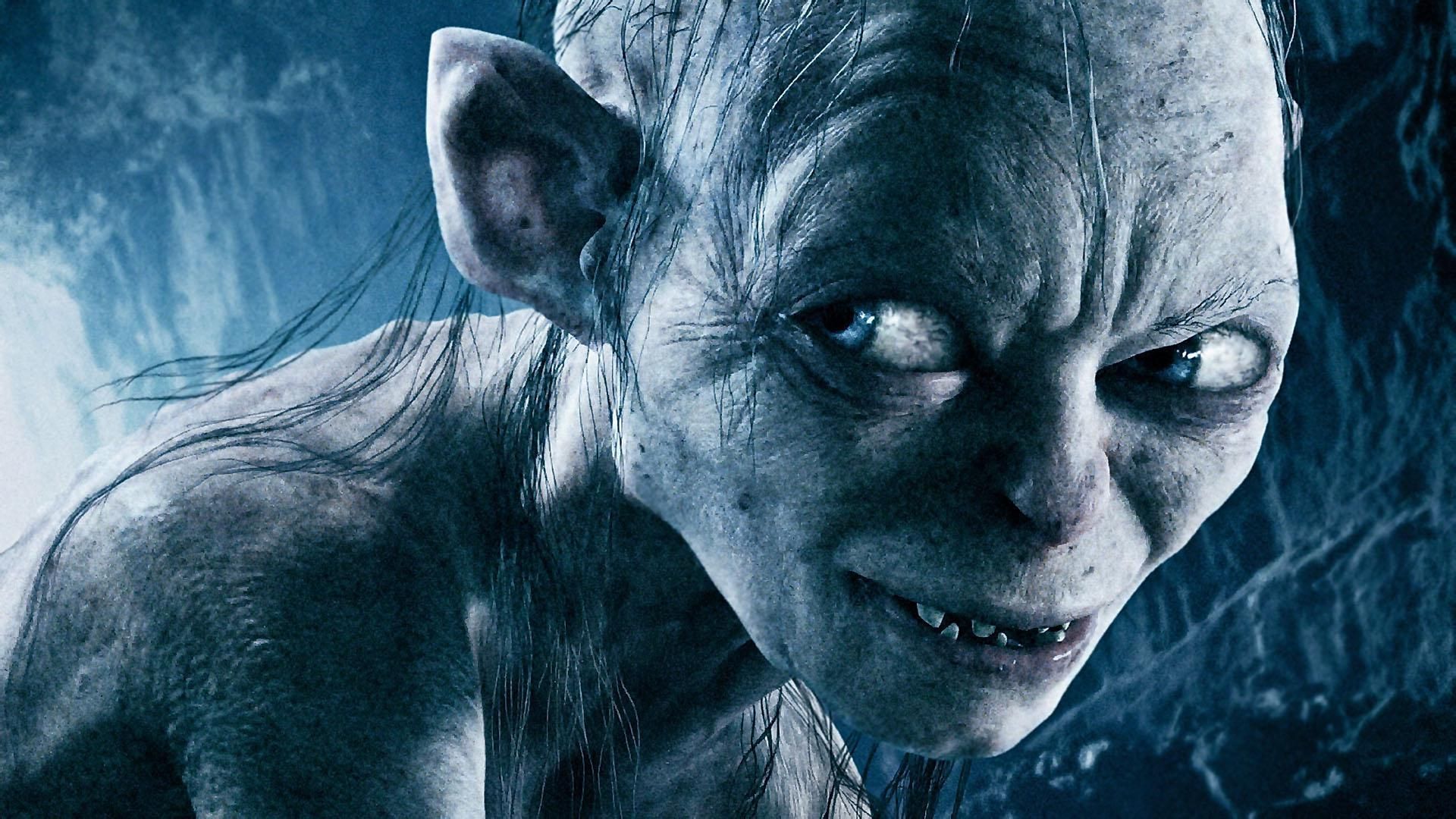 Gollum in Lord of the Rings smiling in a dark cave