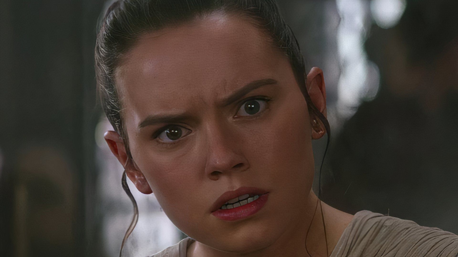 Daisy Ridley as Rey in Star Wars looking worried