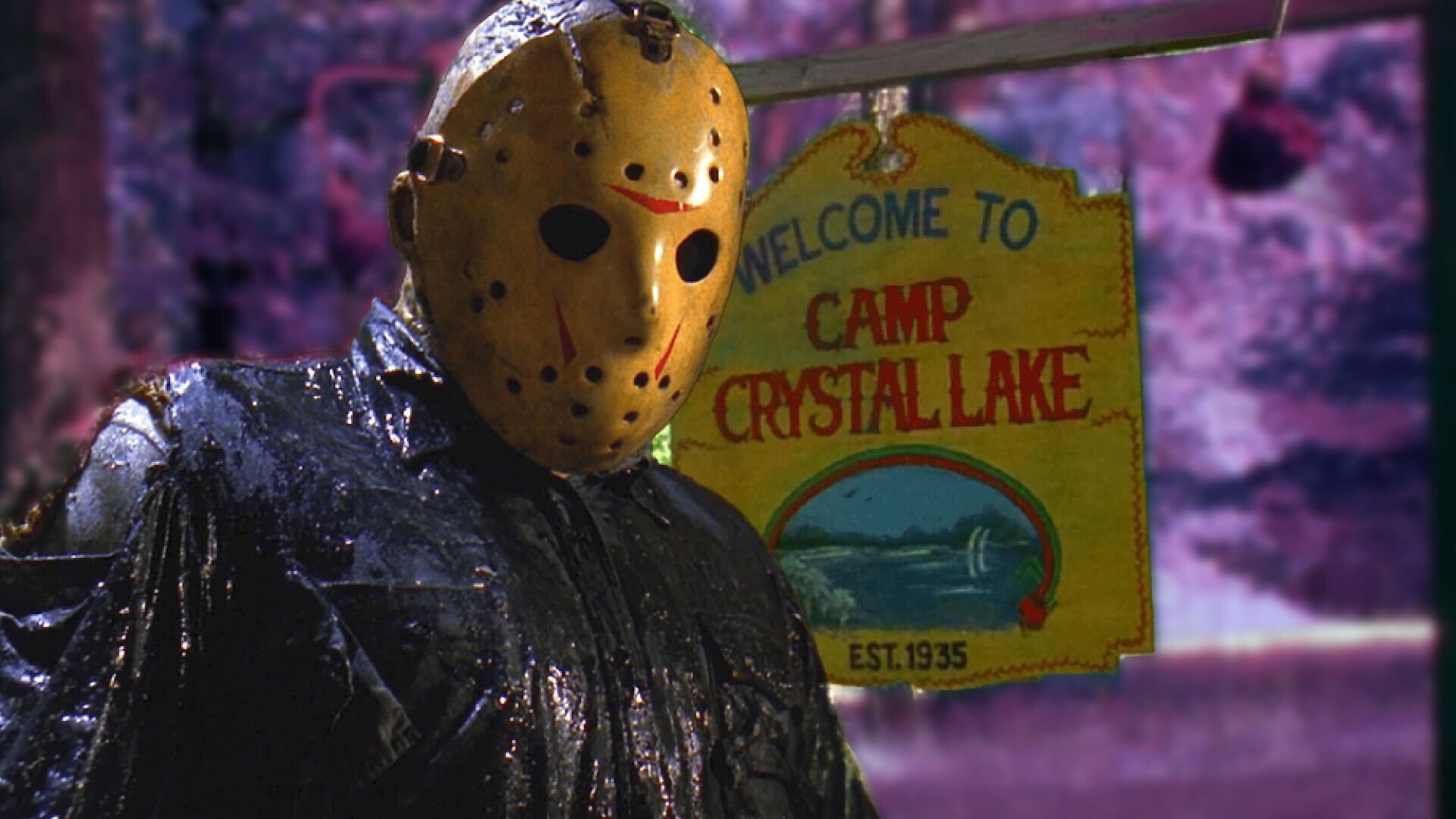 Jason Voorhees in front of a Crystal Lake sign from Friday the 13th