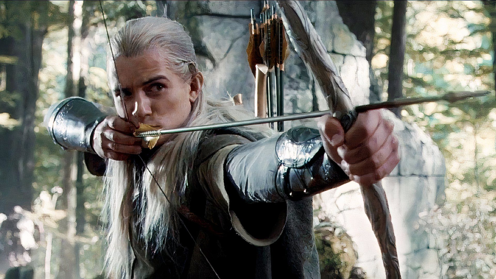 Orlando Bloom as Legolas draws his bow in The Lord of the Rings: The Fellowship of the Ring