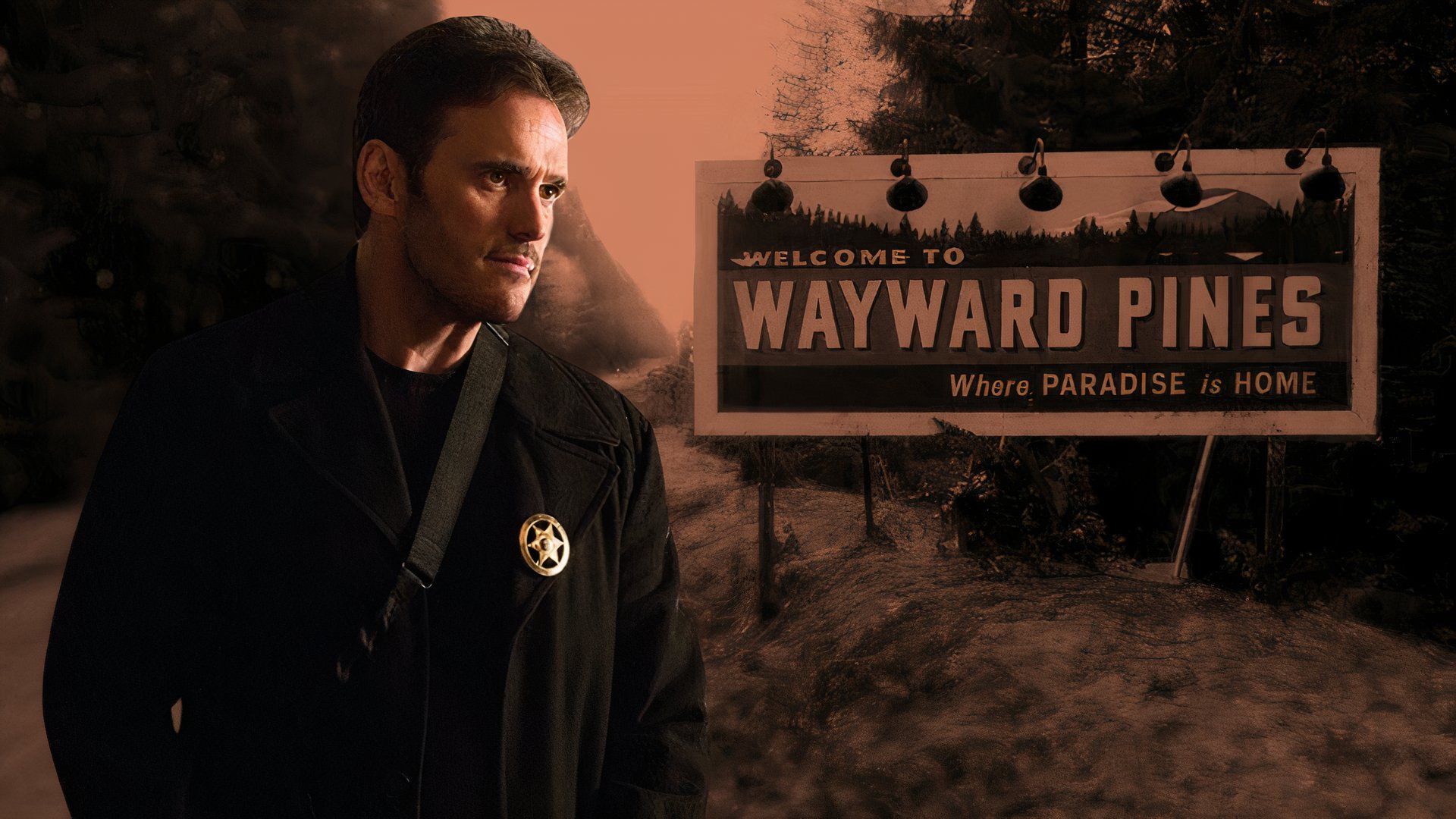 Matt Dillon as Ethan Burke wearing a black coat and badge with a Welcome to Wayward Pines sign in the background