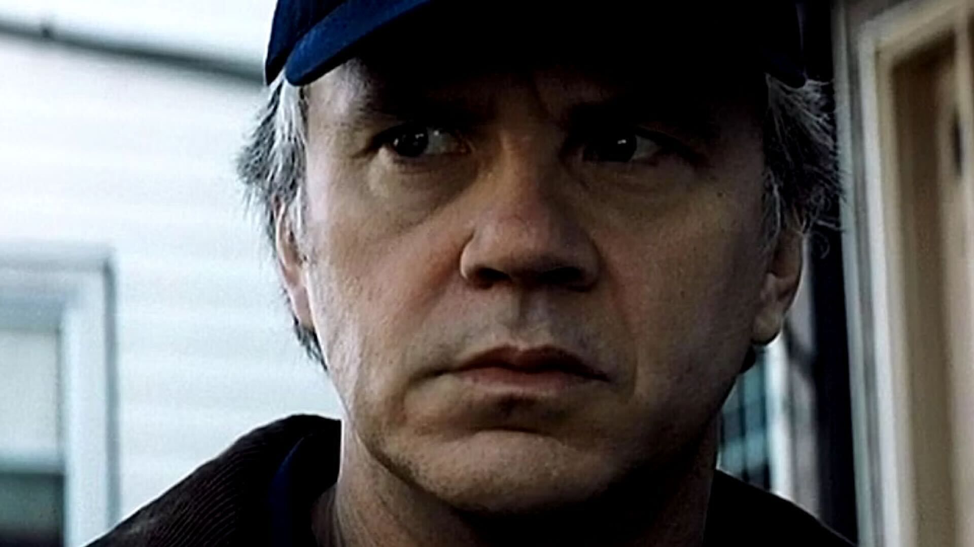 Tim Robbins with cap in Mystic River