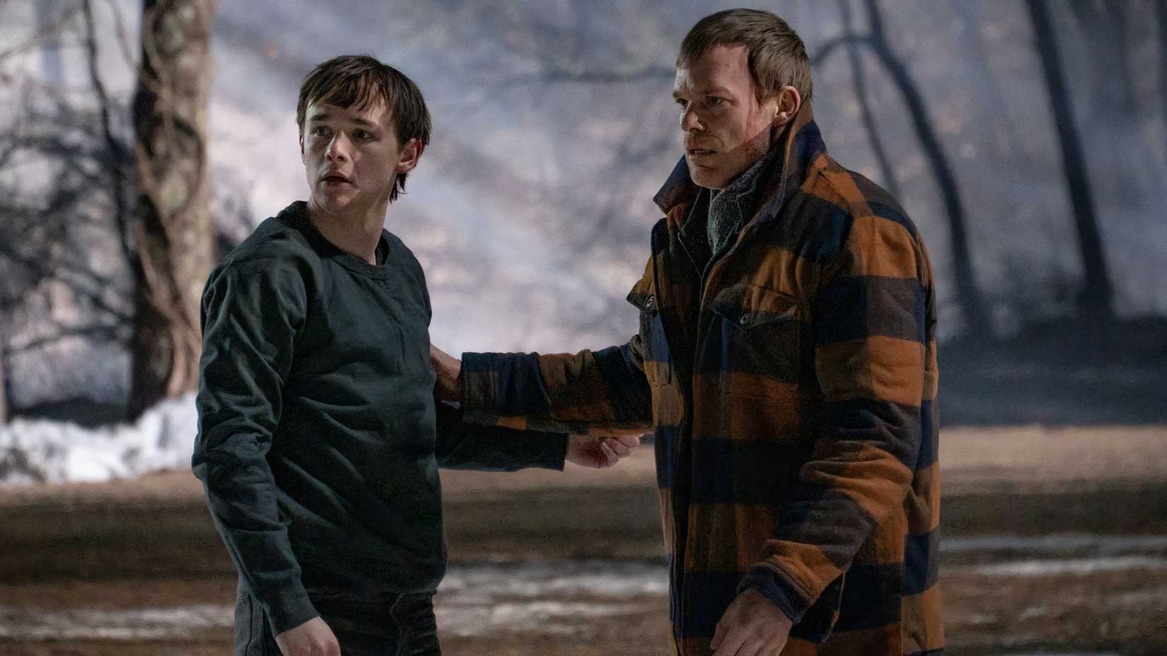Harrison and Dexter standing outside in the cold looking worried on Dexter: New Blood.