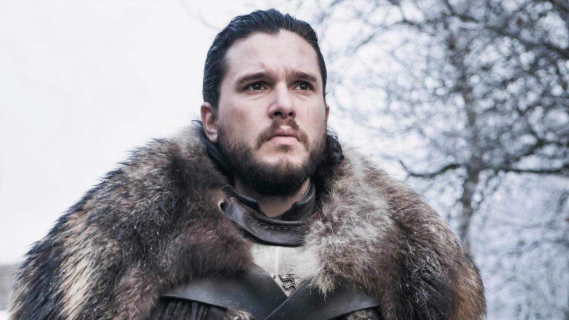 Game of Thrones Kit Harington as Jon Snow wearing a fur coat in the snow