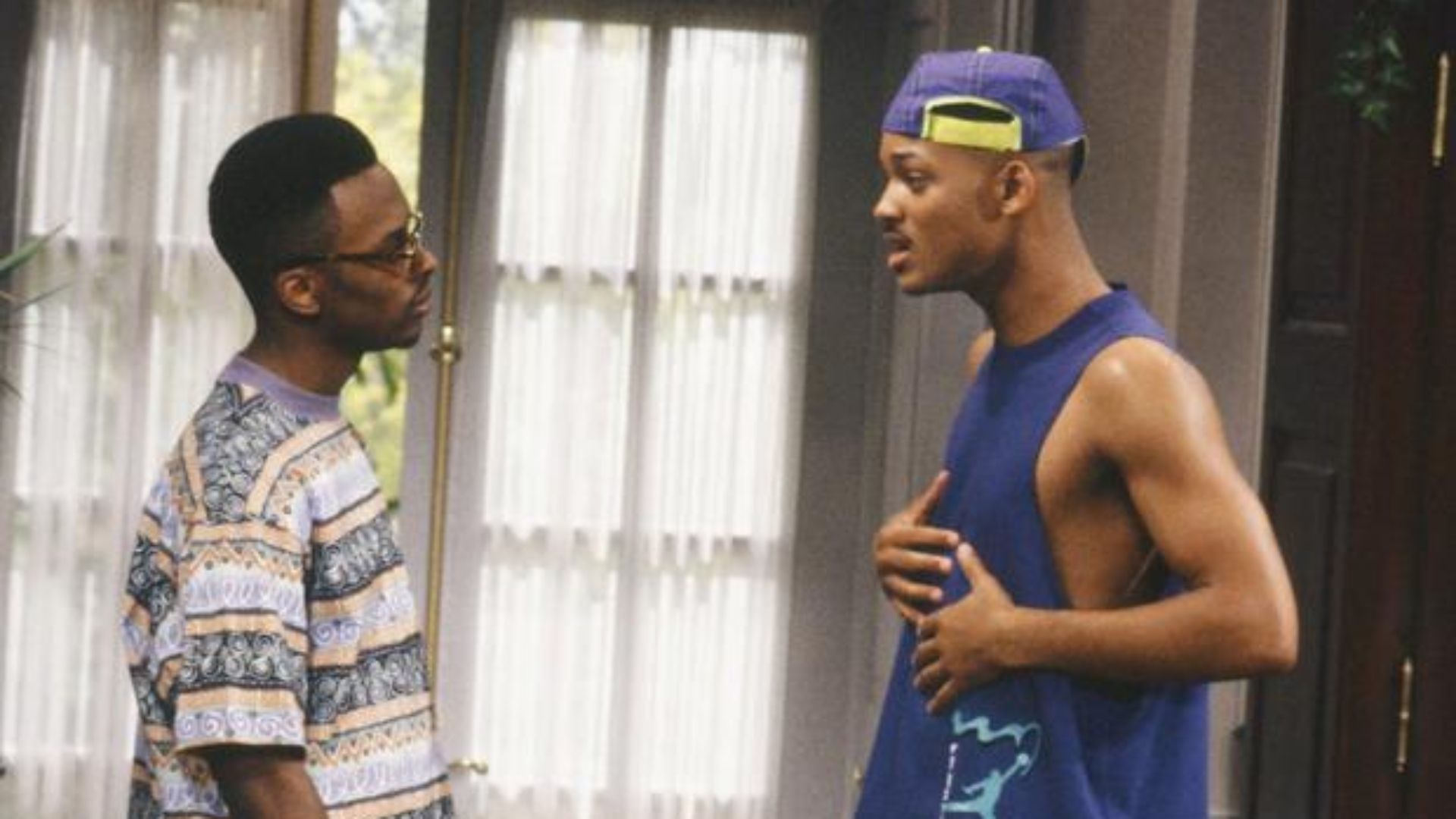 Jazz & Will in a scene talking face to face from The Fresh Prince of Bel-Air