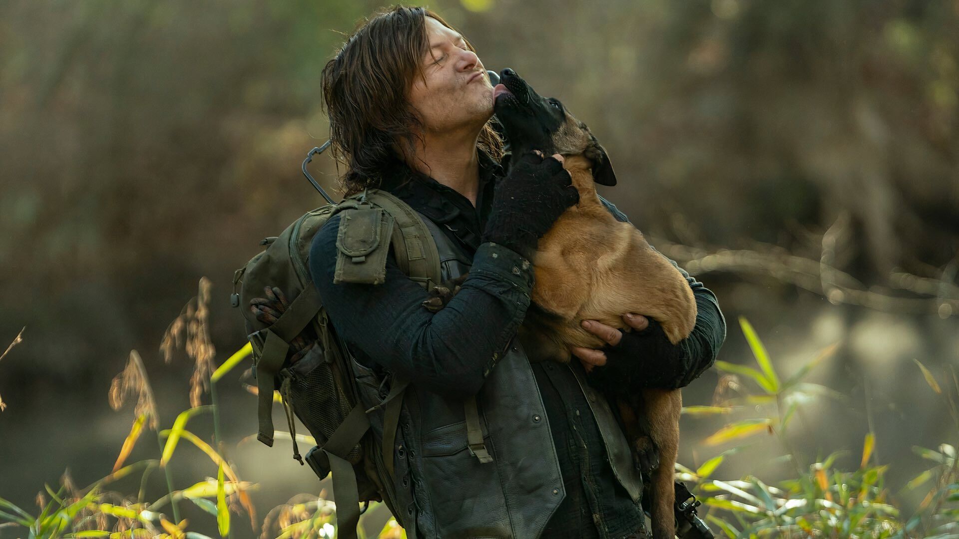 Norman Reedus with dog in The Walking Dead