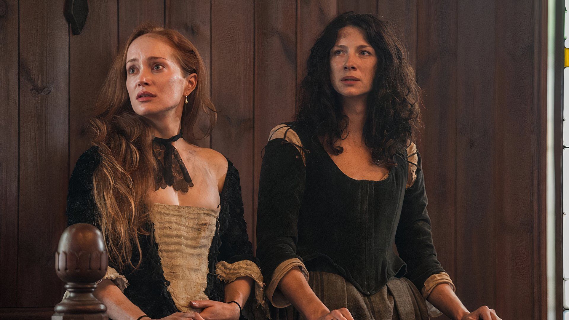 Geillis and Claire at witch trial in Outlander
