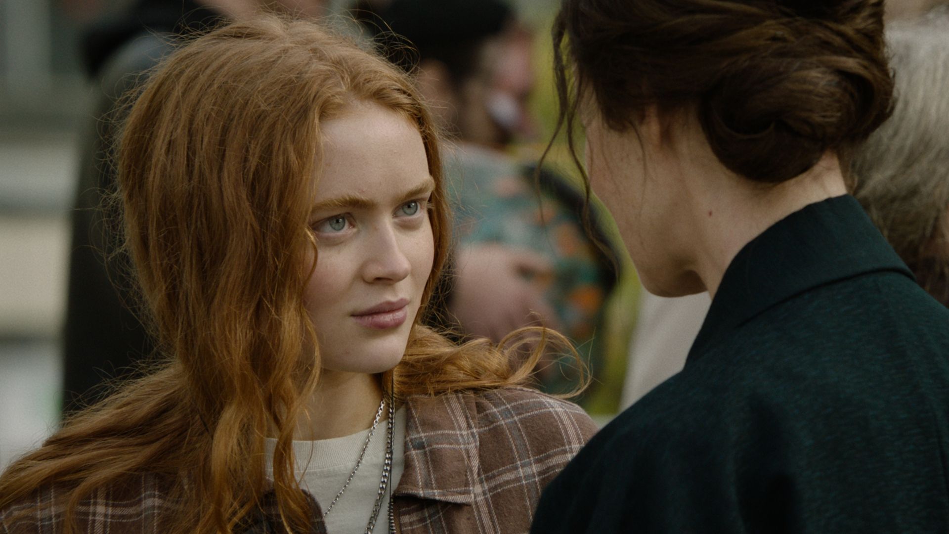 Sadie Sink speaks with a woman in the 2024 movie A Sacrifice