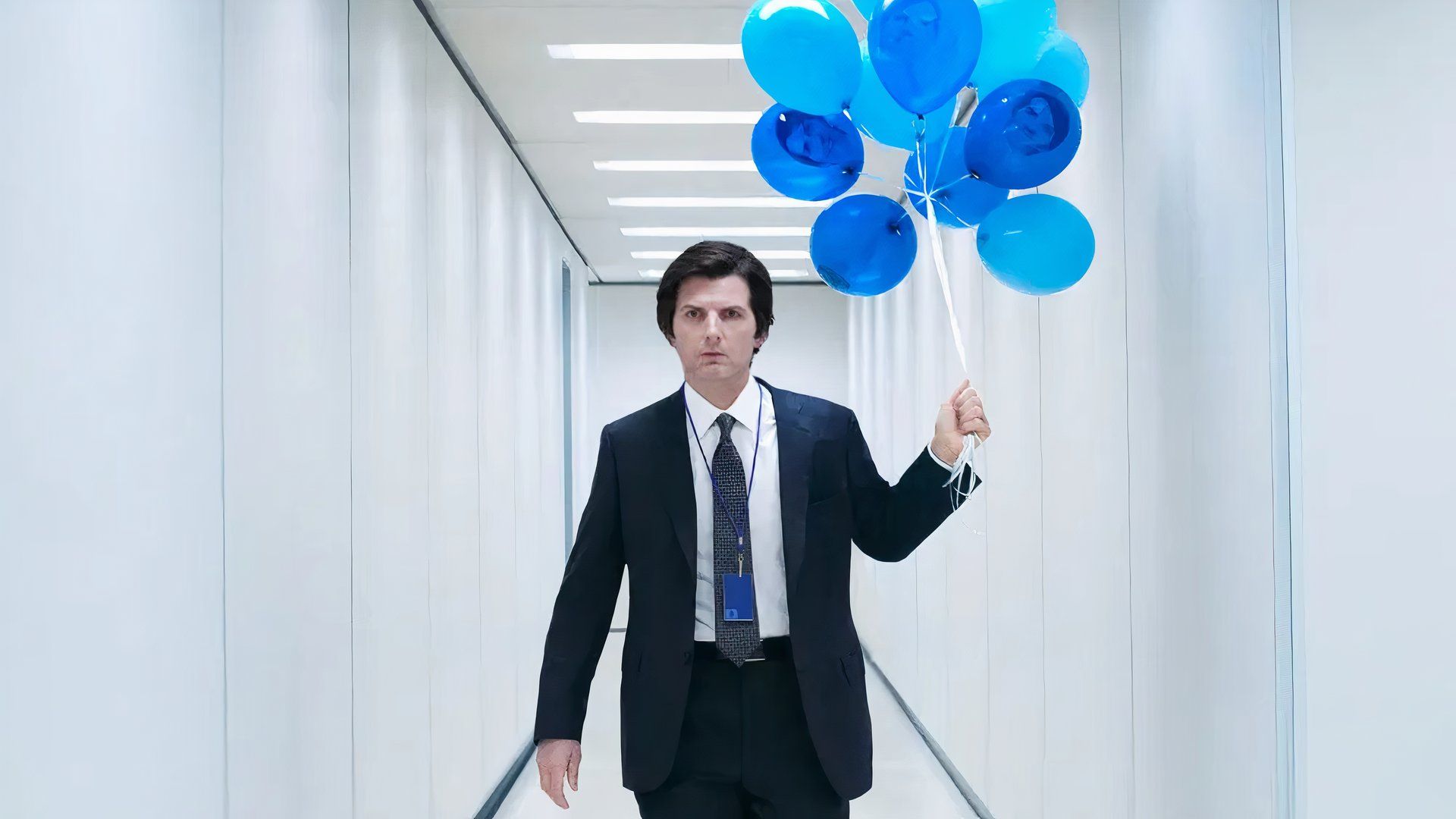 Severance Season 2 first look with Adam Scott holding blue balloons
