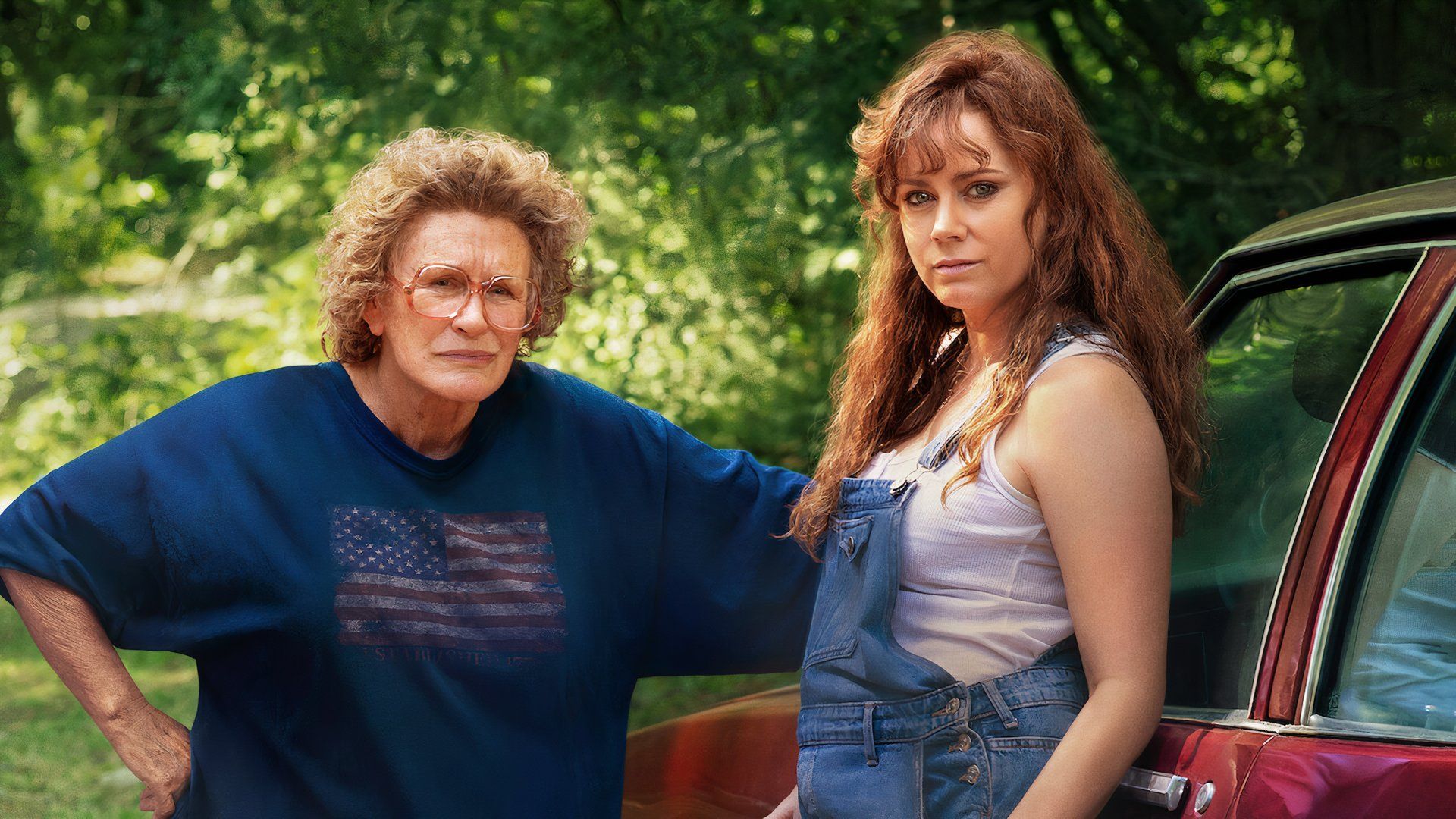 Mama and Bev stand next to a car in Hillbilly Elegy