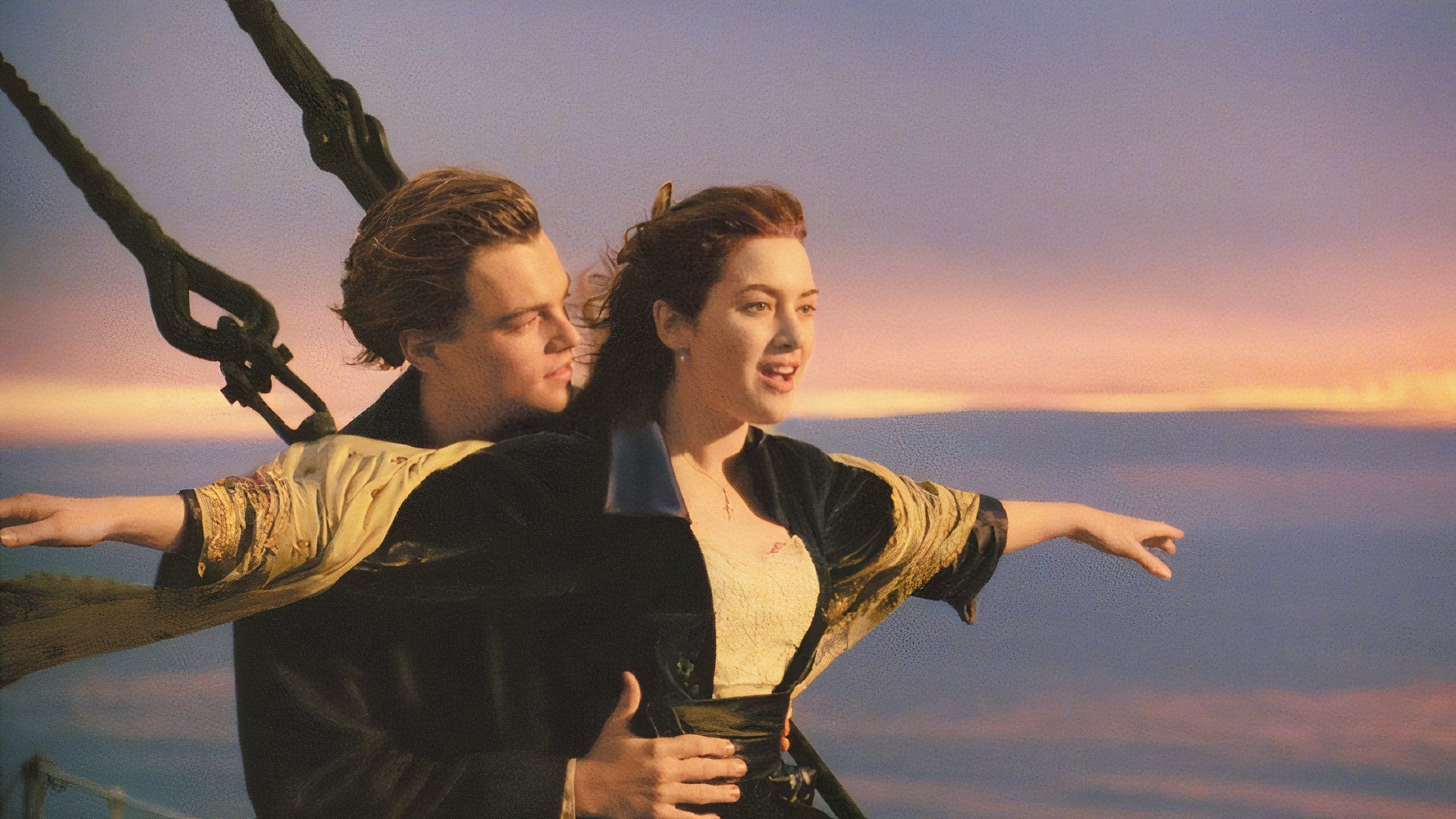 Jack and Rose in Titanic hanging over the front of the ship