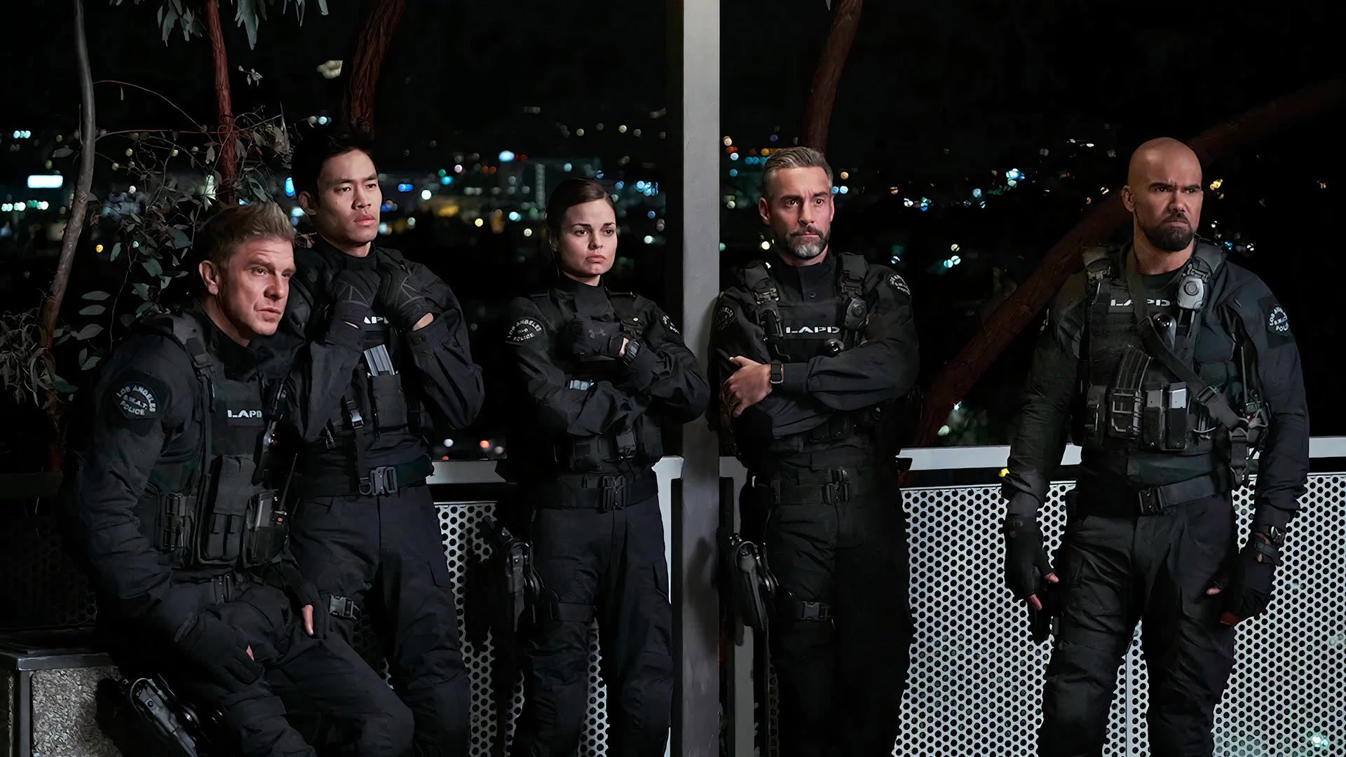 Shemar Moore, David Lim, Jay Harrington, Kenny Johnson, and Lina Esco in a scene from S.W.A.T.