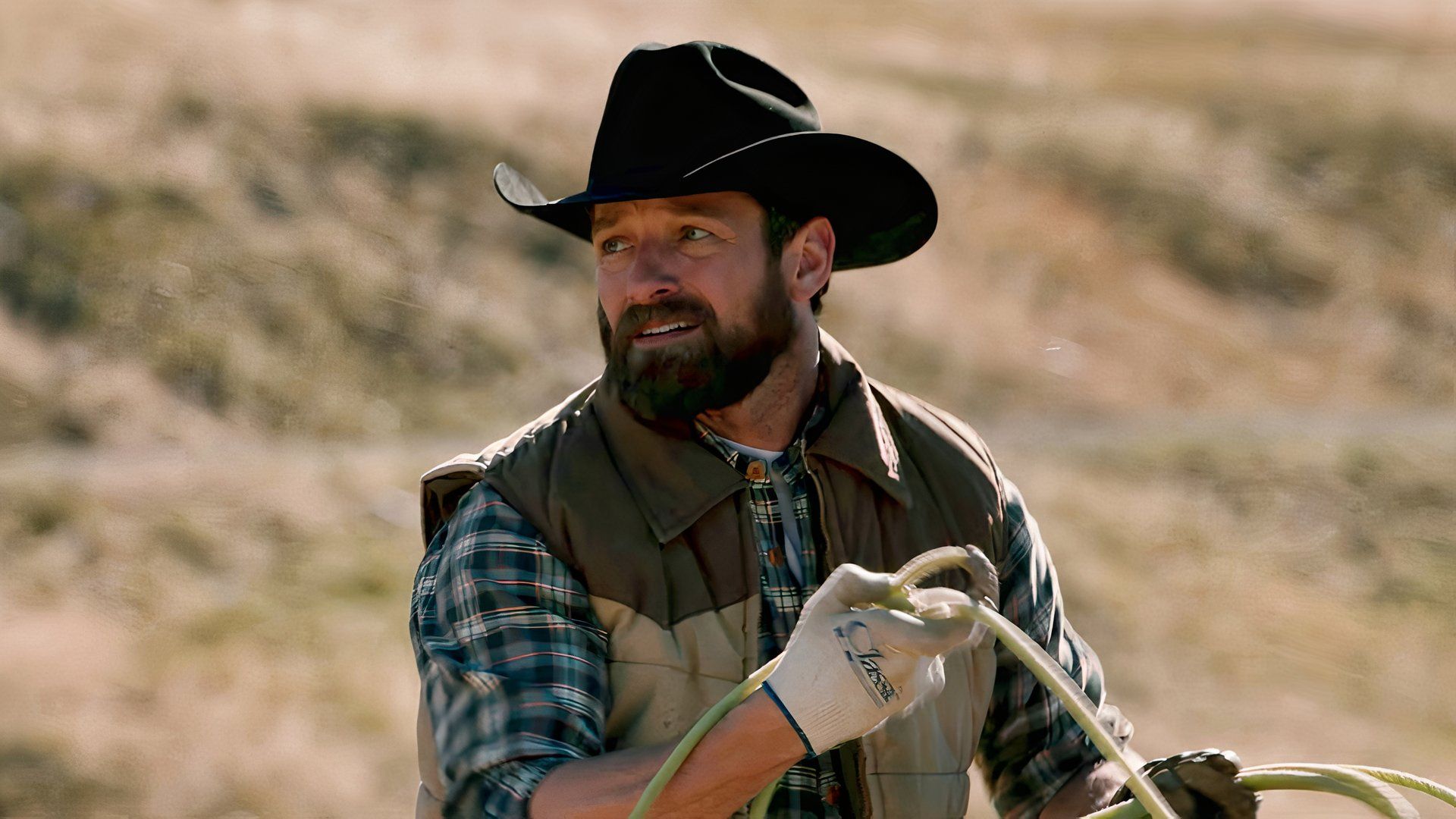 Ian Bohen as Ryan rustles cattle on the Dutton Ranch in a scene from Yellowstone