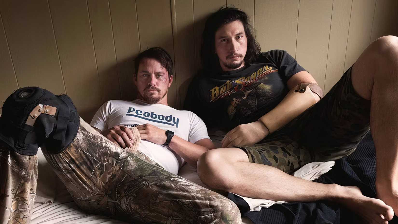 Adam Driver and Channing Tatum lying on the ground in Logan Lucky
