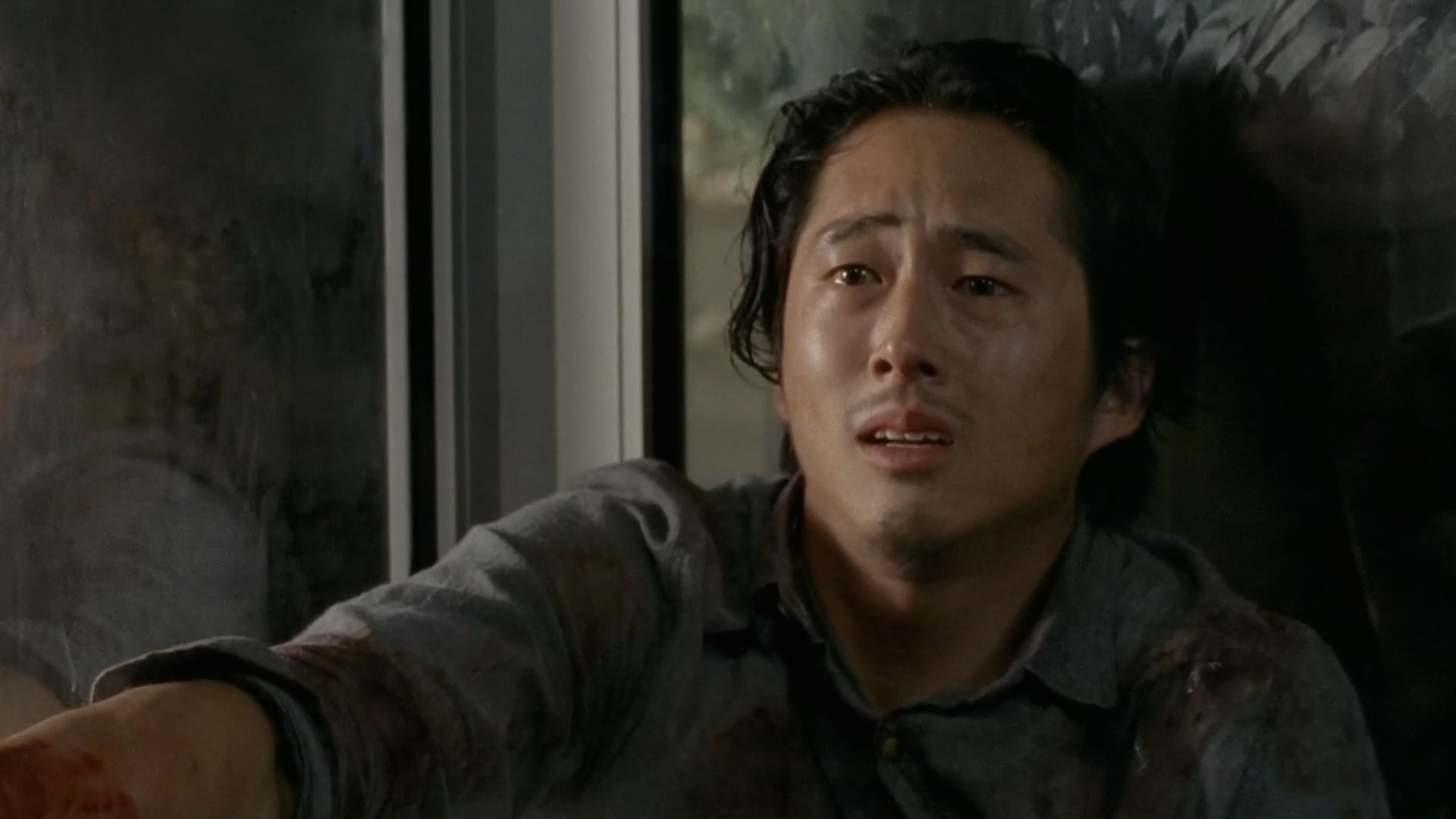 Glenn is devastated in a scene from The Walking Dead