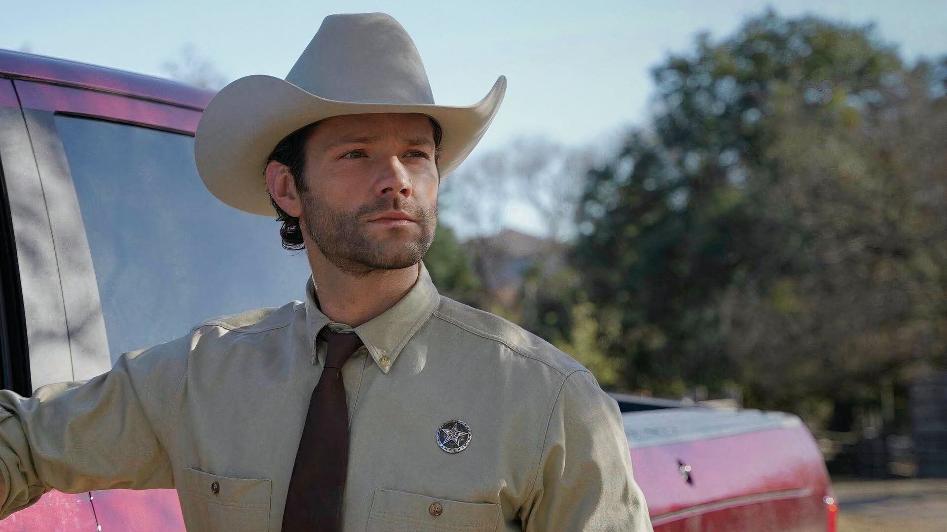 Walker stands next to his truck in Walker