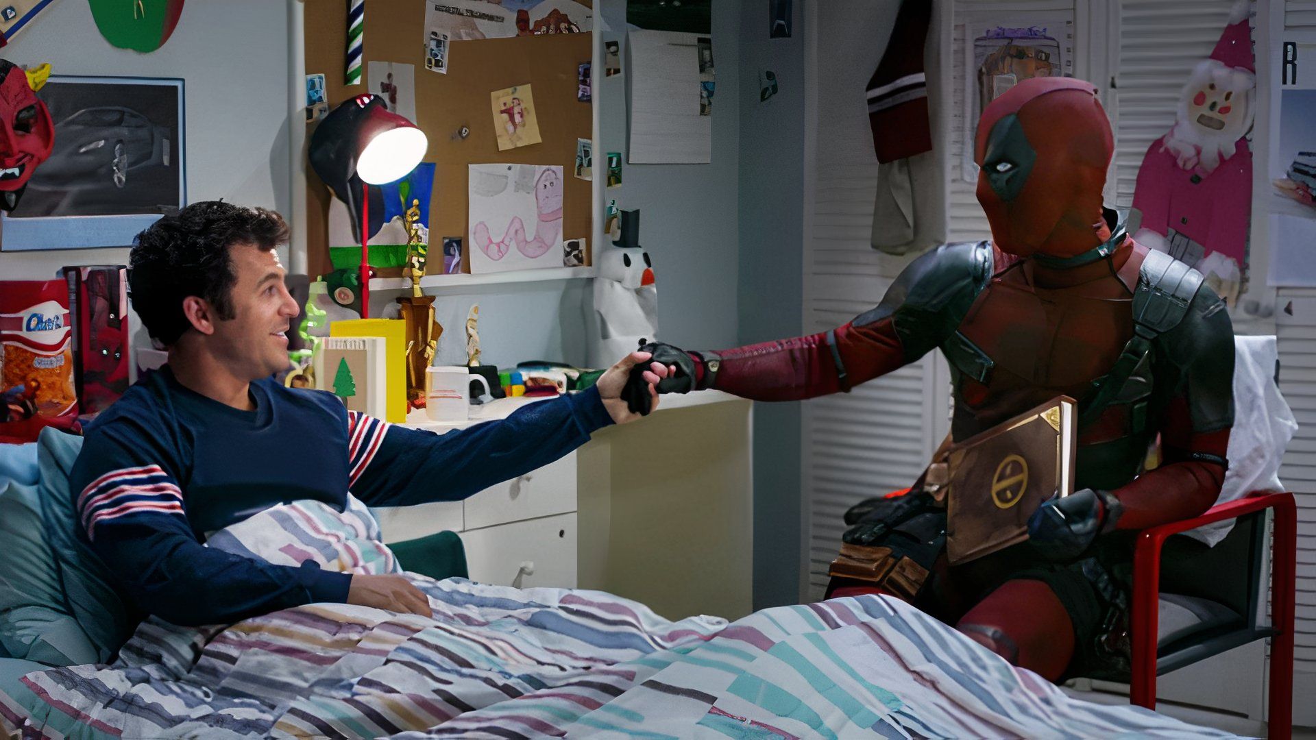 Grandson and Deadpool hold hands in Once Upon a Deadpool