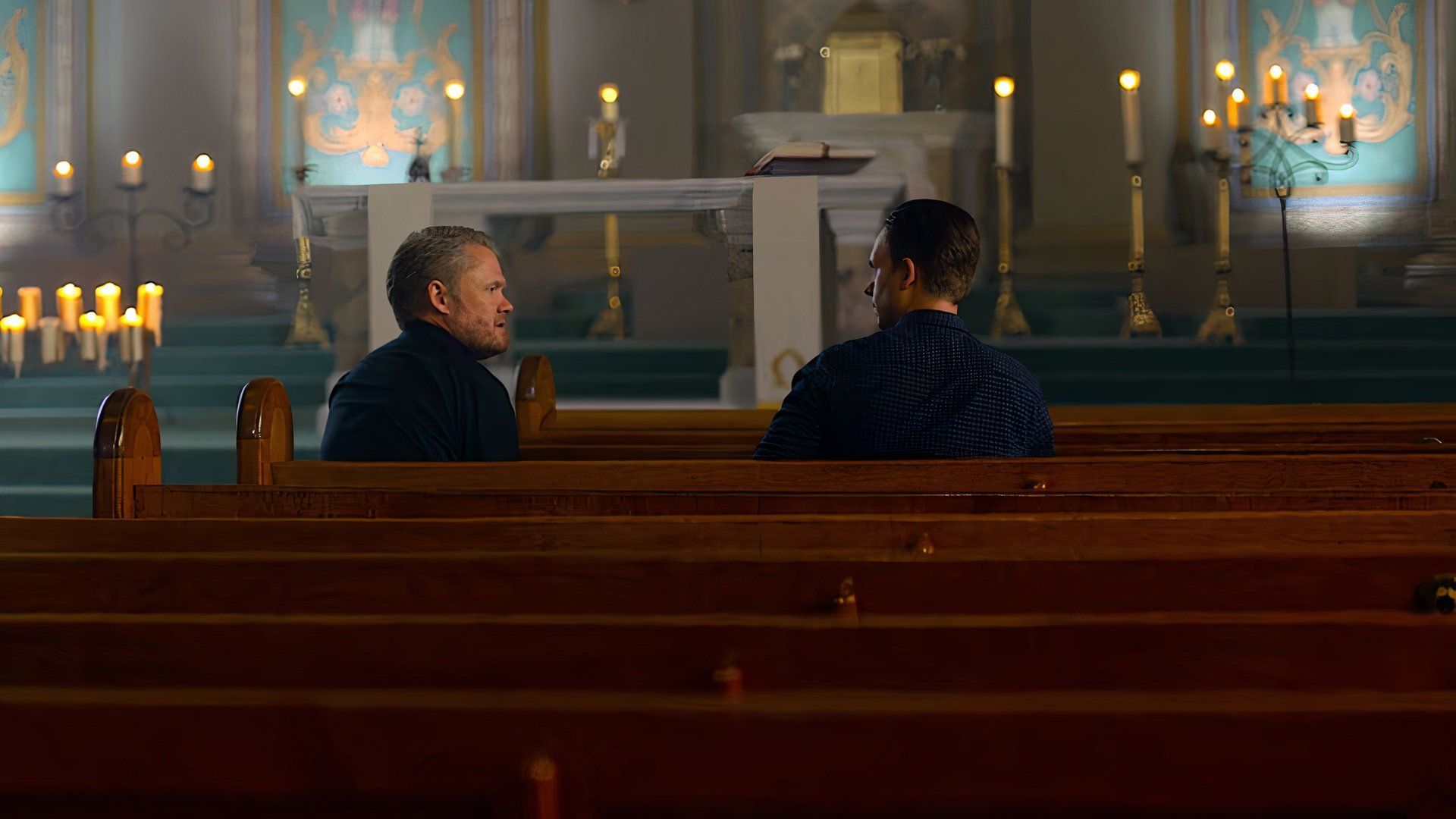 Father Walker and Mike Ross, played by Scott Michael Campbell, and Patrick J. Adams in the legal drama, Suits