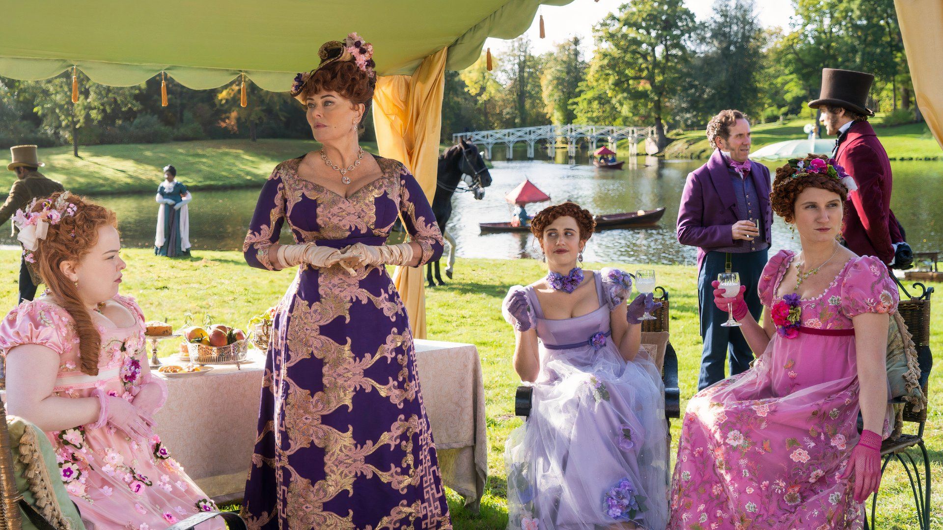 The Featherington family appears in fancy garden dresses in Bridgerton.