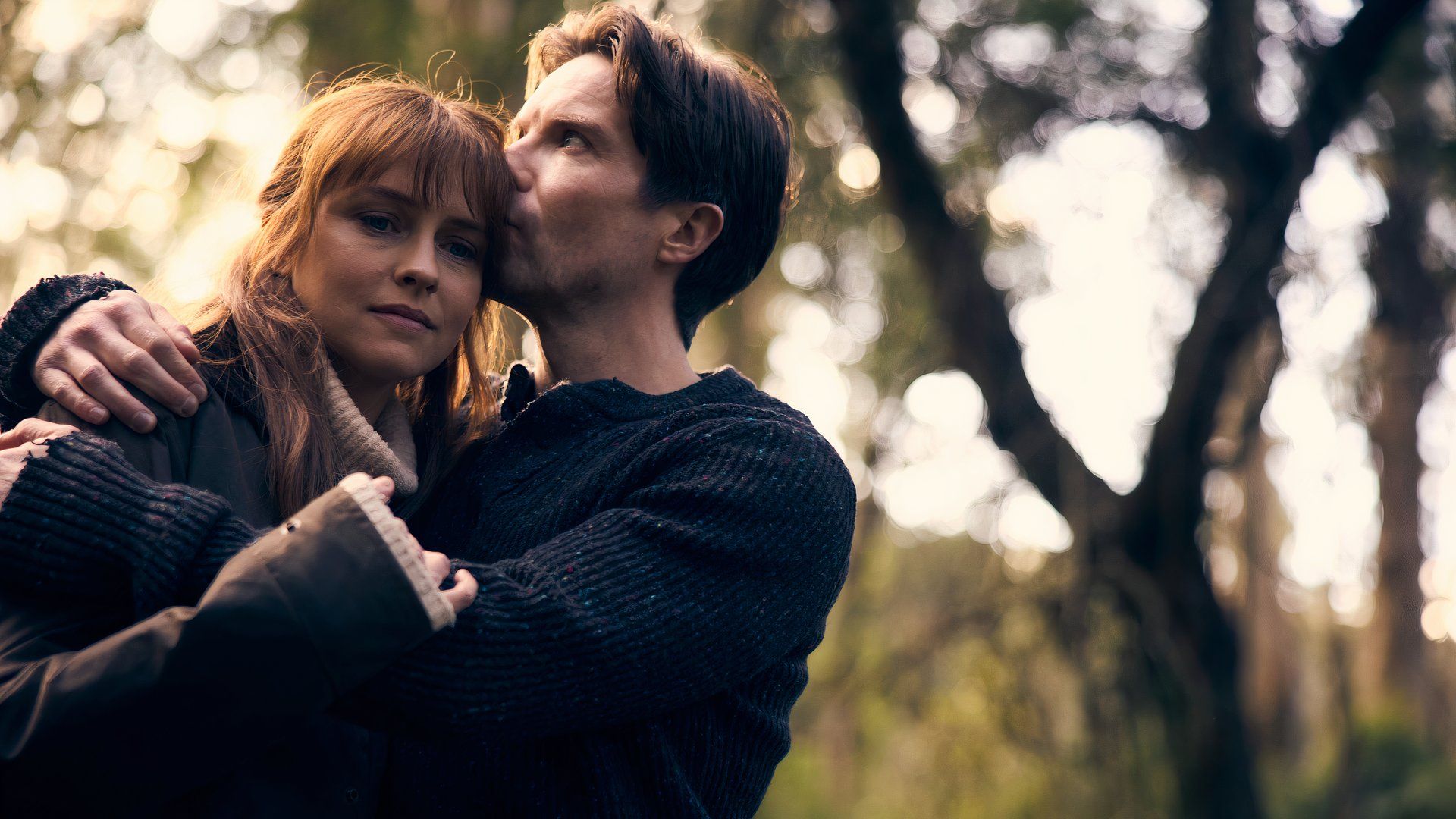 A woman and man hug in sweaters in the movie Addition at TIFF 2024