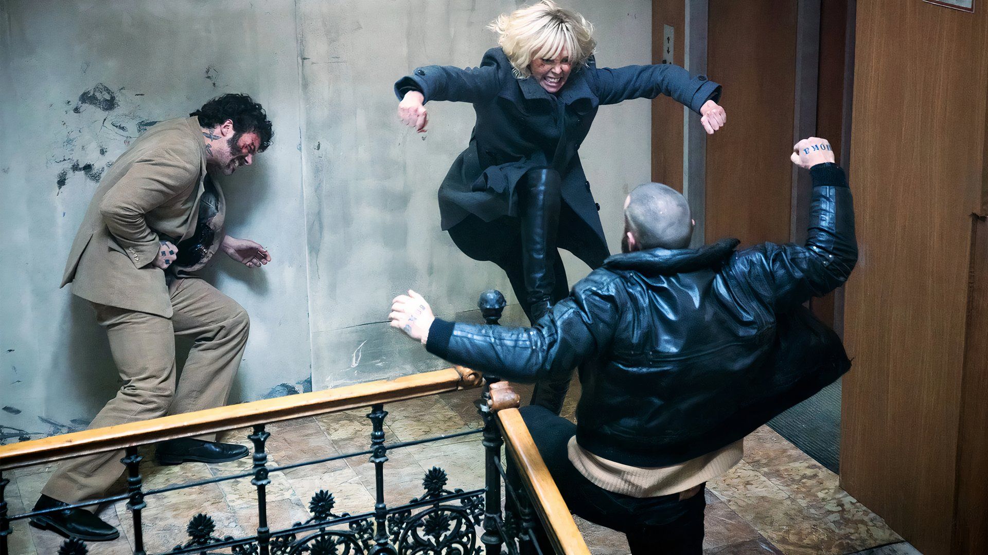 Lorraine kicks a goon in Atomic Blonde