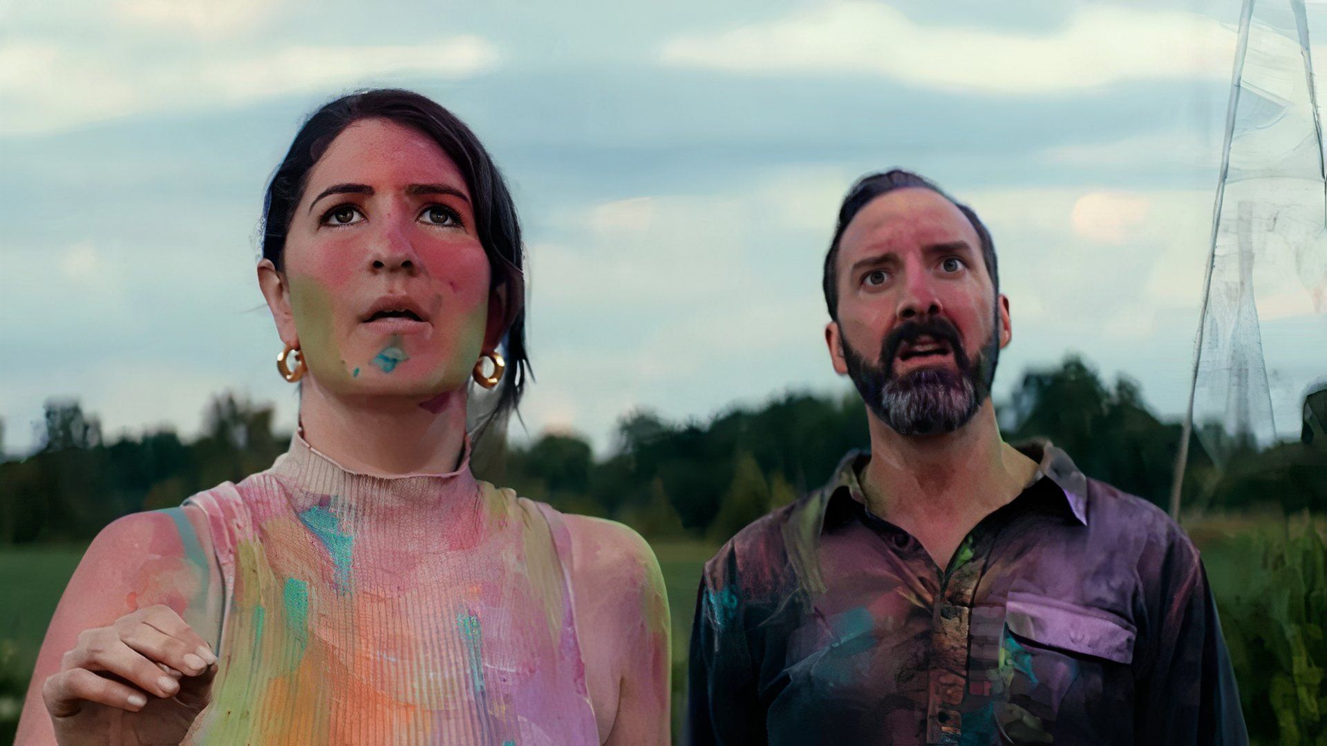 D'Arcy Carden and Tony Hale covered in paint in the movie Sketch